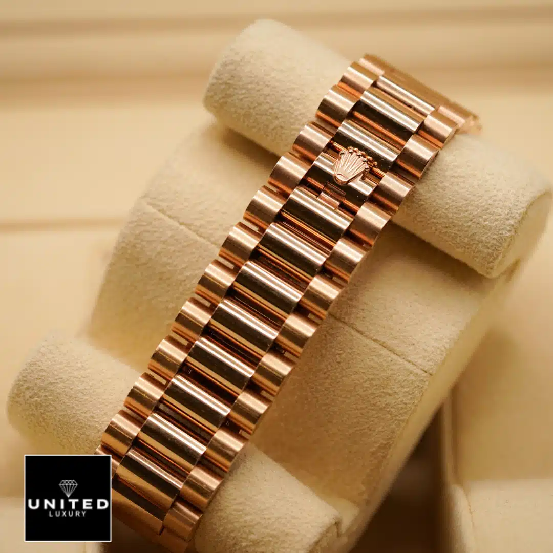 Rolex Day-Date 228345RBR Chocolate Dial Diamond Bezel Inspired 6 Rolex Day-Date 40 228345RBR Inspired Rose Gold Oyster Bracelet on the Rolex Logo
