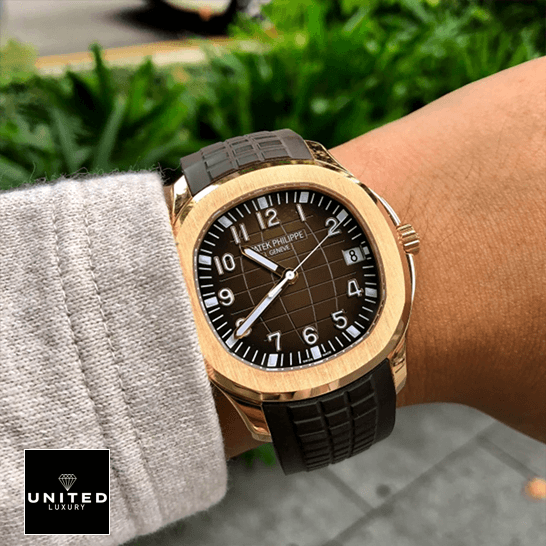 Patek Philippe Aquanaut Rose Gold Case Bezel Inspired grass background