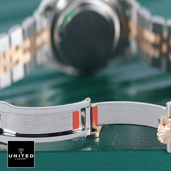 Rolex 279161 Everose Gold Jubilee Inspired opened clasp on the green table
