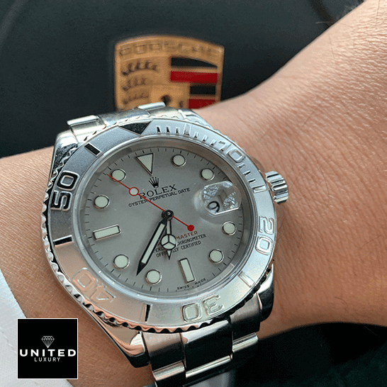 Rolex 116622PLSO Platinum Dial Steel Inspired porsche in the background